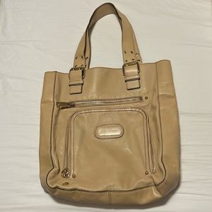 Great Marc Jacobs tote. tan color with gold hardware. Great condition.